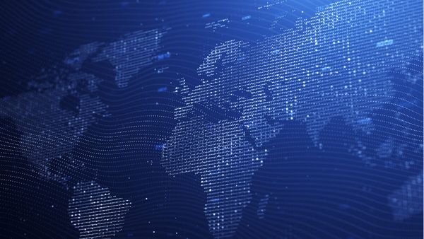 World map illustration of glowing dots and lines forming a digital network